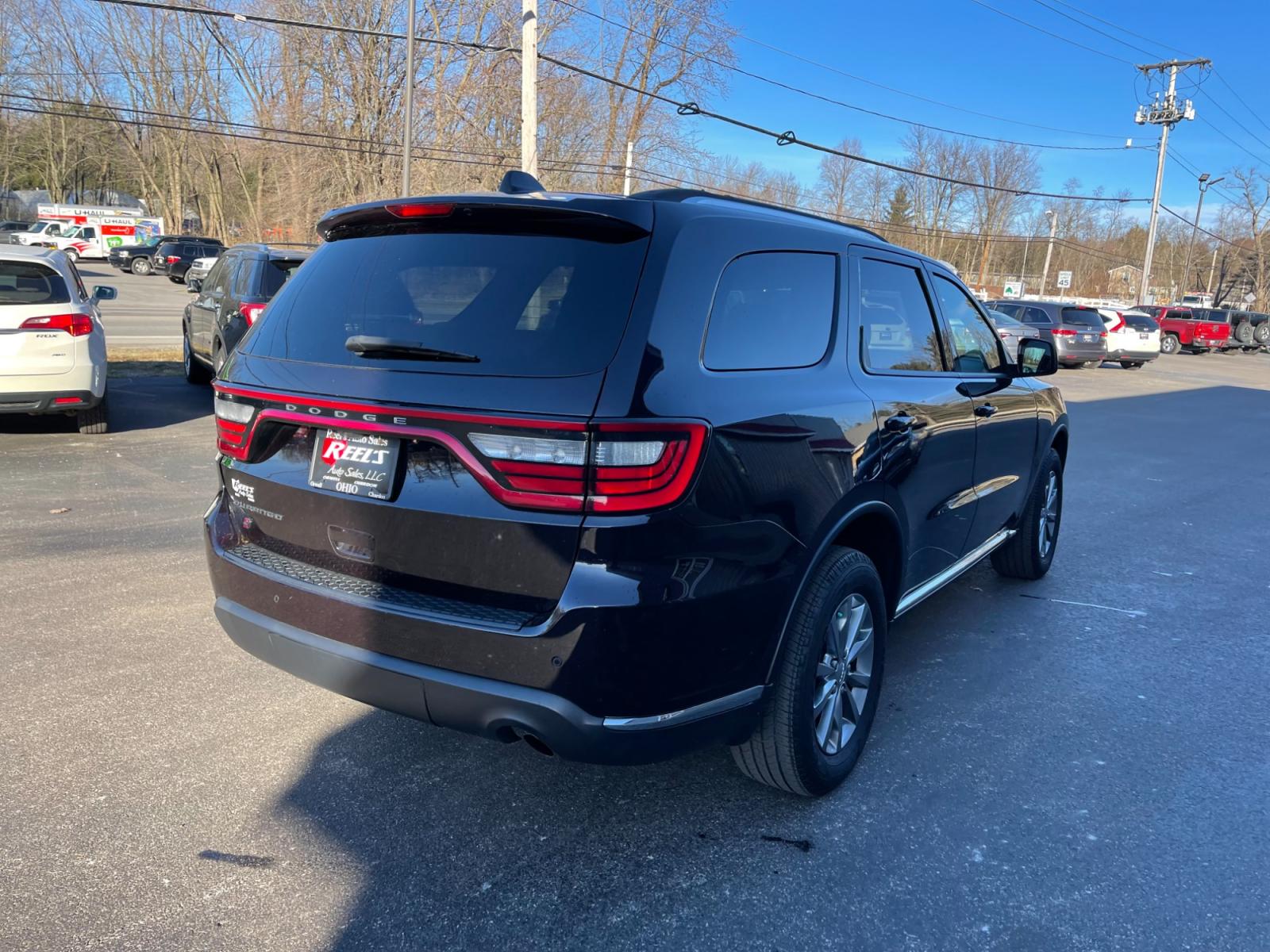 2018 Purple /Black Dodge Durango SXT Plus AWD (1C4RDJAG4JC) with an 3.6L V6 DOHC 24V engine, 8A transmission, located at 547 E. Main St., Orwell, OH, 44076, (440) 437-5893, 41.535435, -80.847855 - This 2018 Dodge Durango SXT Plus AWD is equipped with a powerful 3.6 Pentastar V6 engine paired with an 8-speed automatic transmission, offering a blend of performance and efficiency. This model features a comfortable interior with a power driver's seat, heated front seats, and a heated steering whe - Photo #7